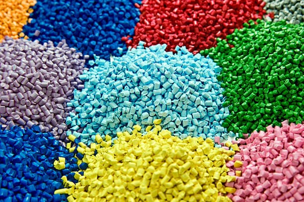 Picture of plastic granules in various colors